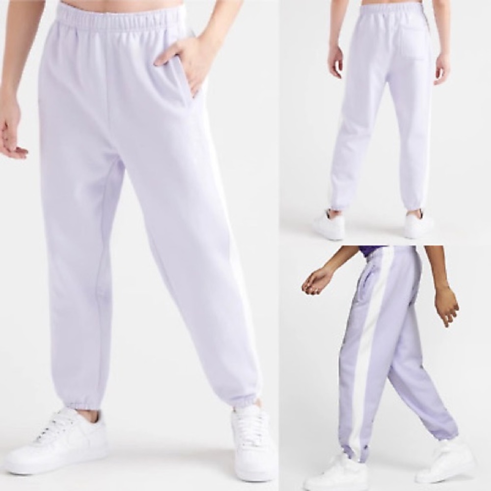Lavender Nike Sweatpants with white stripe down the side